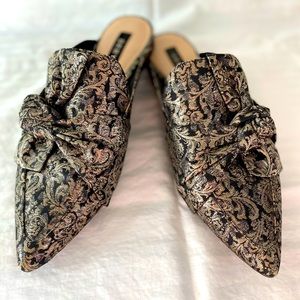 DKNY gold and black slide mules